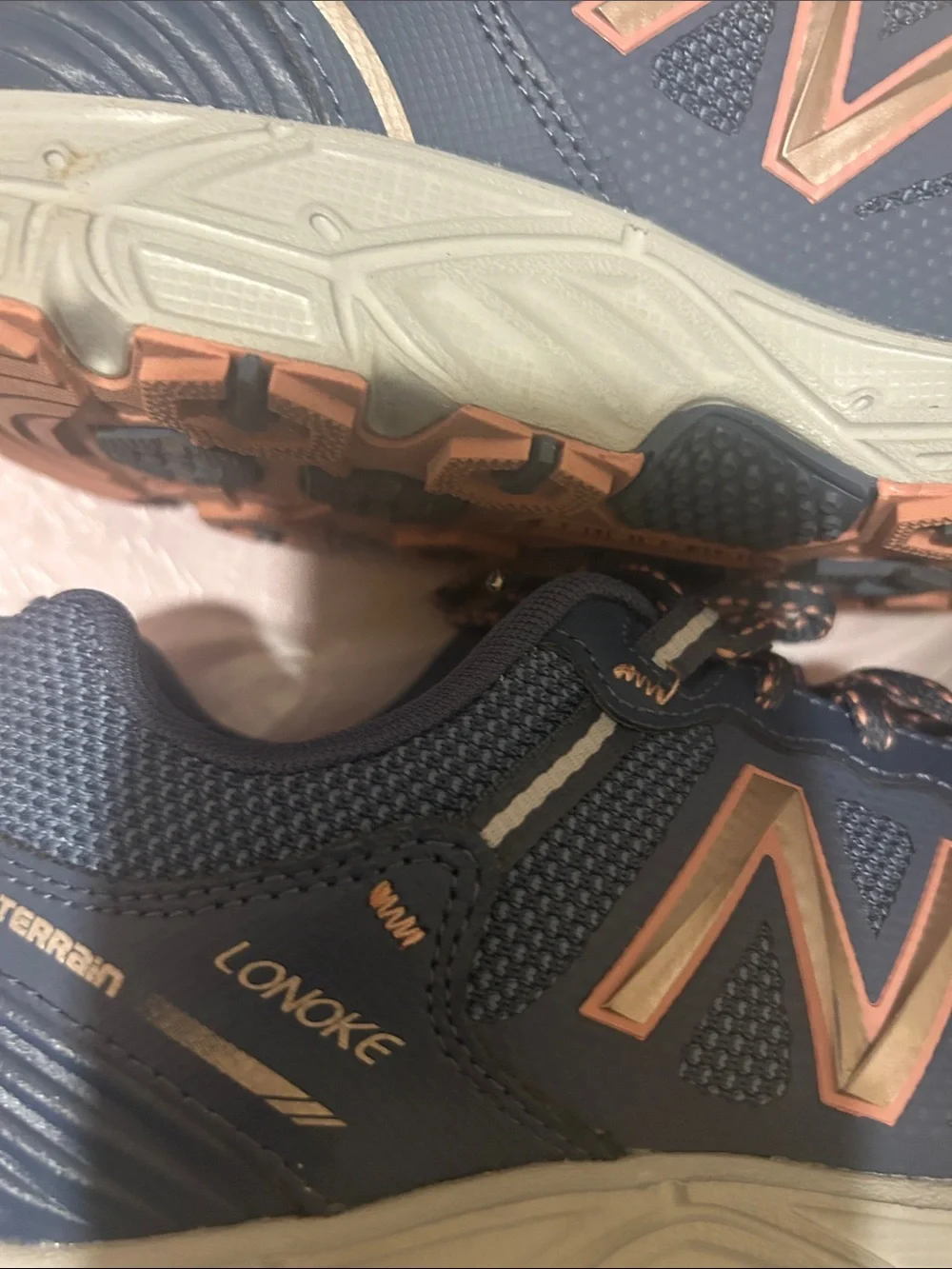 New Balance Women’s Navy with Rose Gold Accent Sneakers
